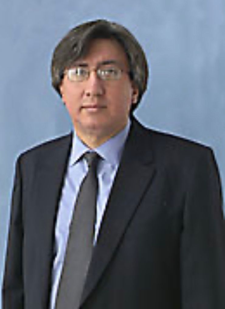 Dr. Nelson R Claure